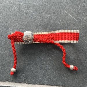 Links of London bracelet, adjustable. Sterling silver and red.